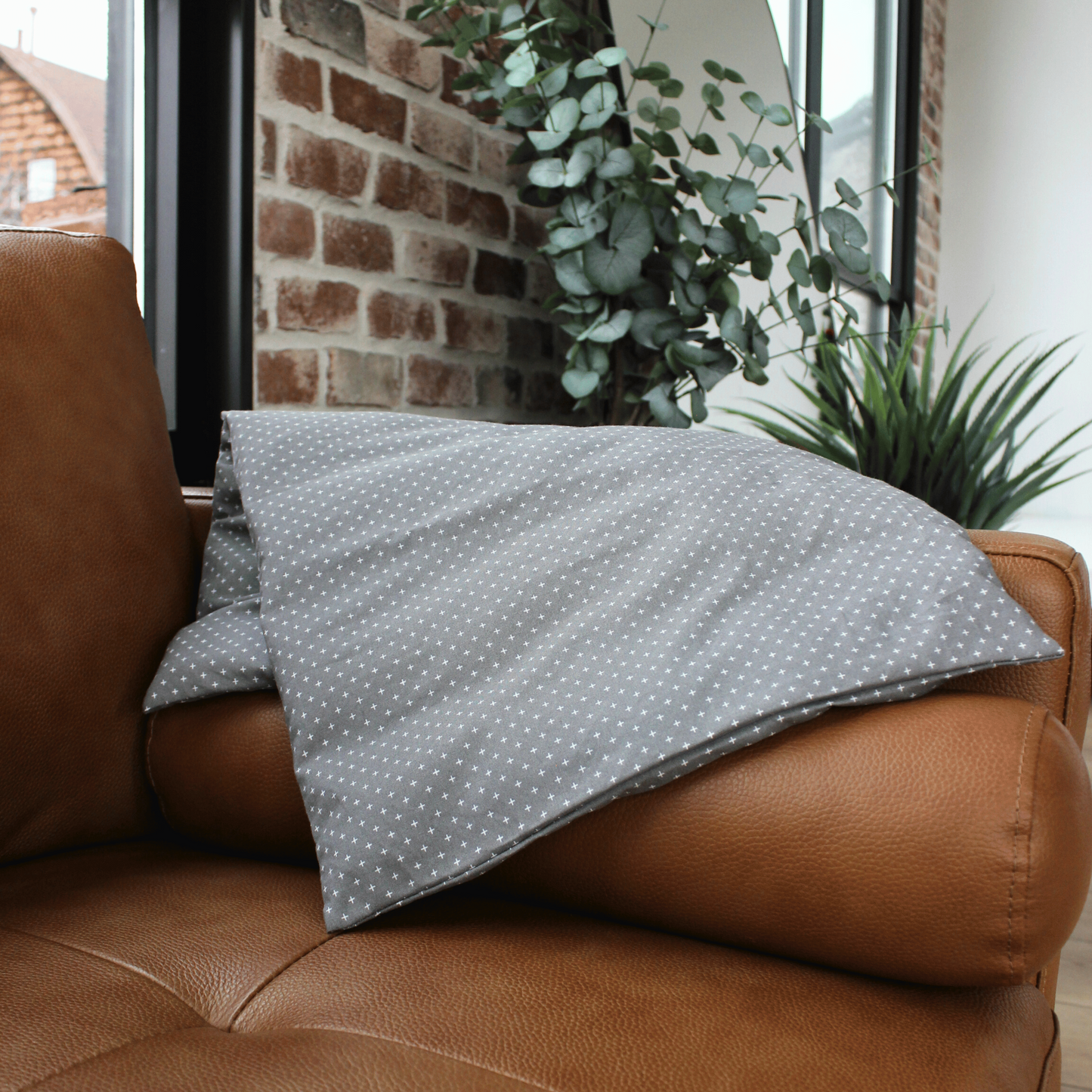 Gray heating pad for body