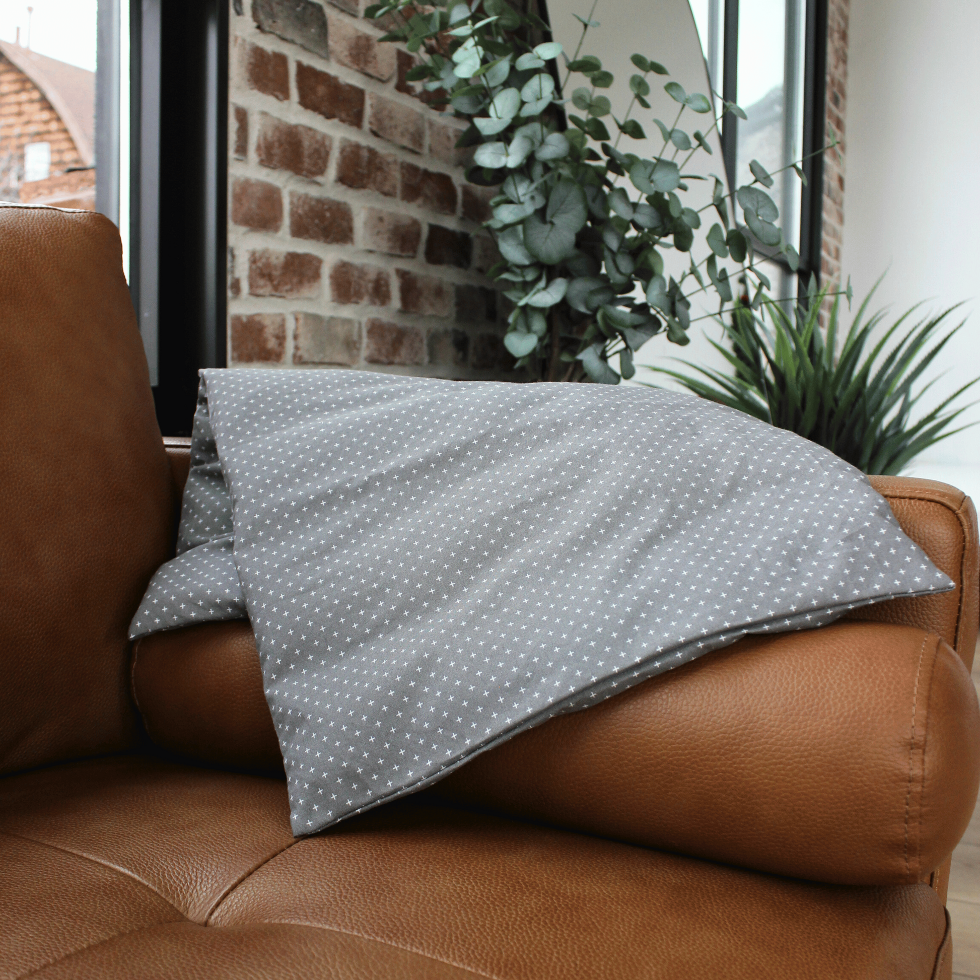 Gray heating pad for body